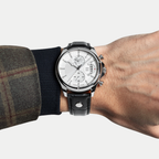 Breckmont Meridian silver men's dress watch on wrist white dial black leather strap